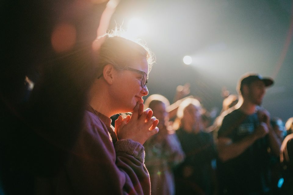 Youth group members in Bible study session